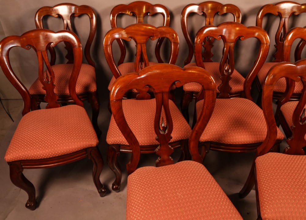 A Good set of 12 Victorian Mahogany Spear Point Balloon Back Dining Chairs View III