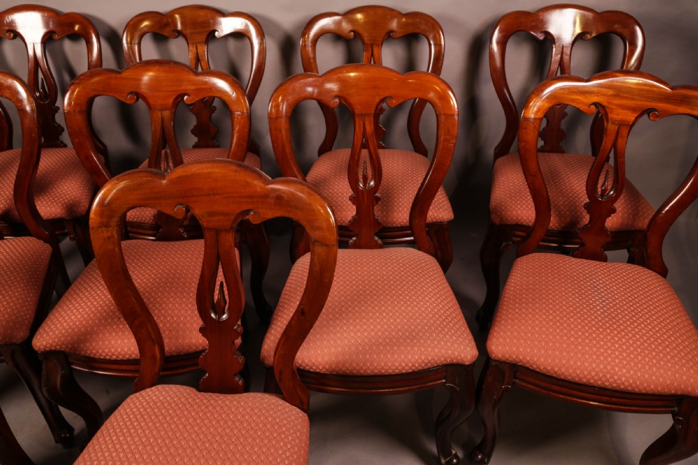 A Good set of 12 Victorian Mahogany Spear Point Balloon Back Dining Chairs View IV