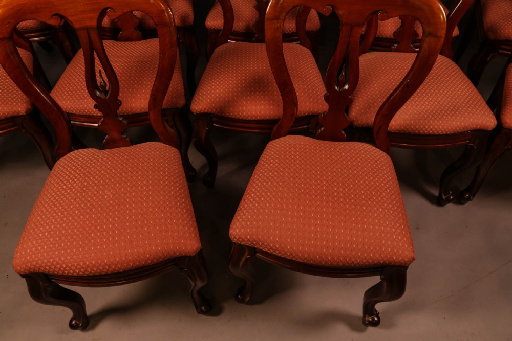 A Good set of 12 Victorian Mahogany Spear Point Balloon Back Dining Chairs View V