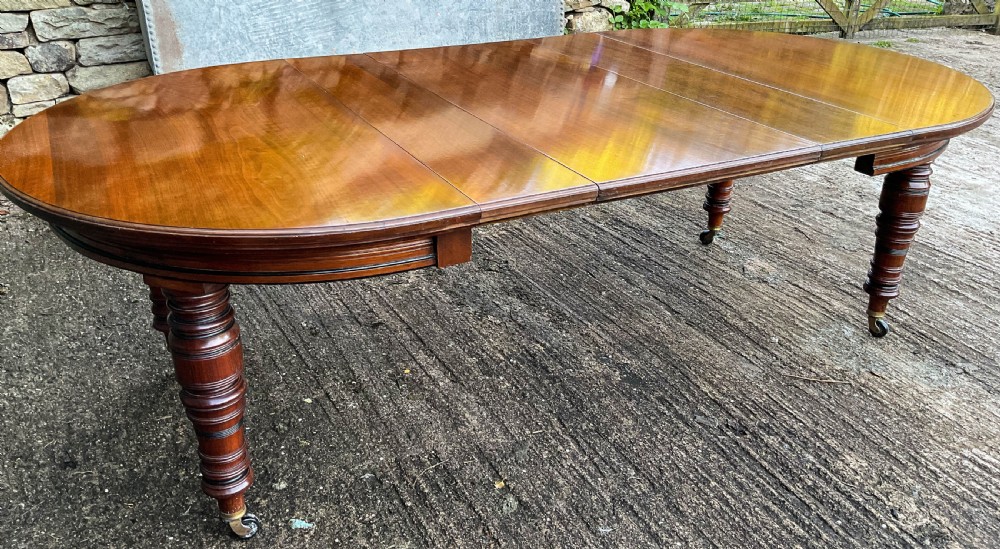 A Victorian 3 leaf Extending Dining Table in Walnut View XV