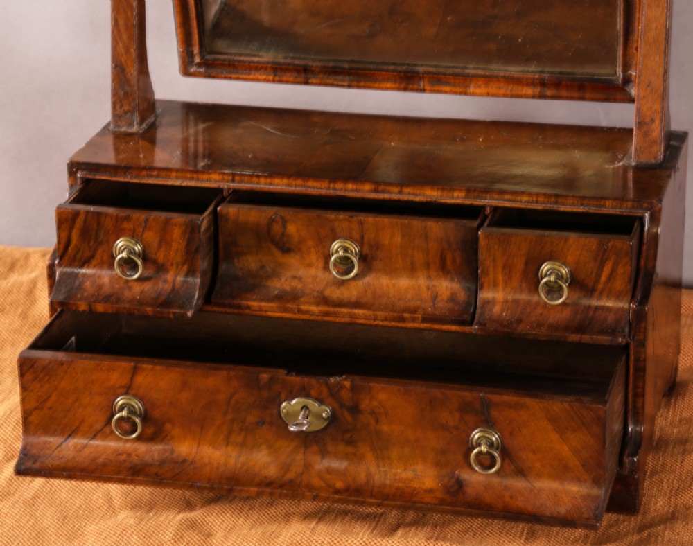 A Queen Ann Period Dressing Morror in Walnut View II