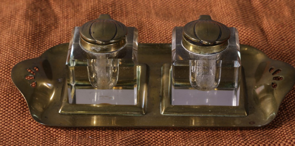 An Art Neuvaux Brass and Glass ink Well