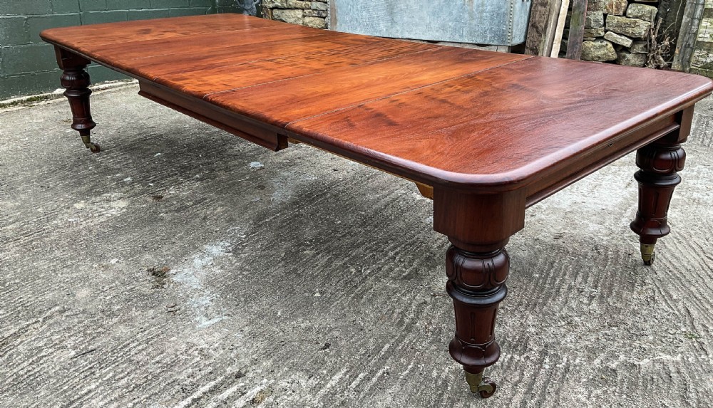 A Good Victorian Mahogany Extending Dining Table seat 12