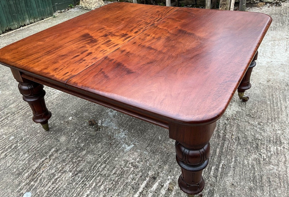A Good Victorian Mahogany Extending Dining Table seat 12 View III