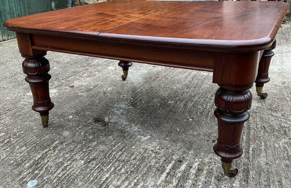 A Good Victorian Mahogany Extending Dining Table seat 12 View IV