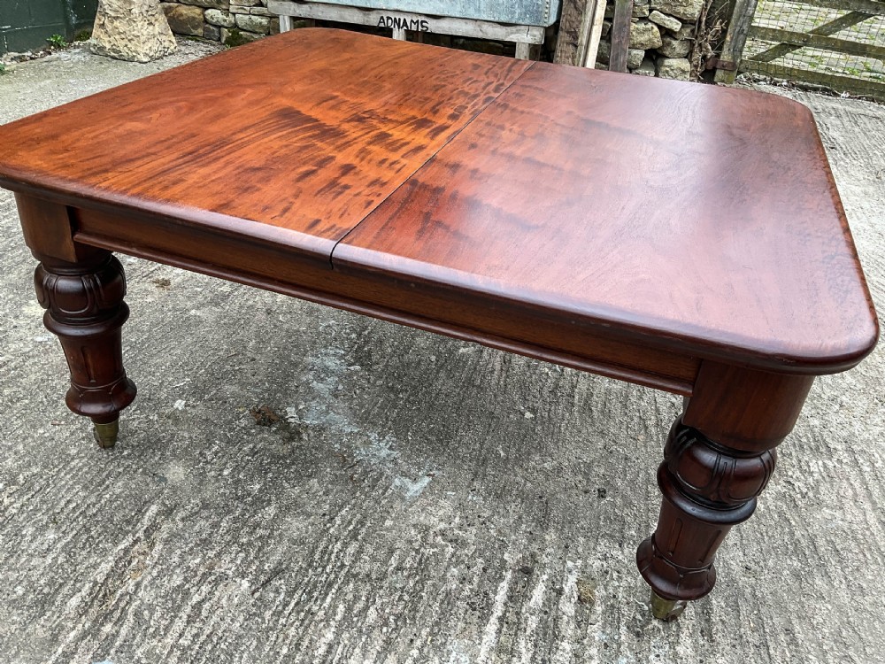 A Good Victorian Mahogany Extending Dining Table seat 12 View V