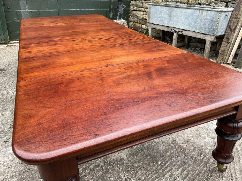 A Good Victorian Mahogany Extending Dining Table seat 12 View VI