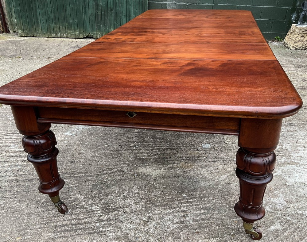 A Good Victorian Mahogany Extending Dining Table seat 12 View VII
