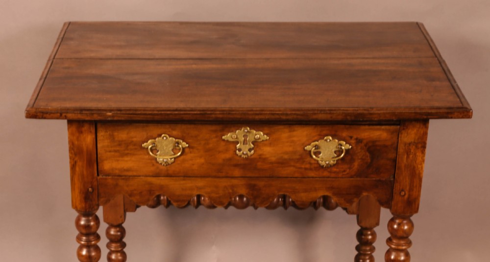 An early 18th century side table in Walnut View II