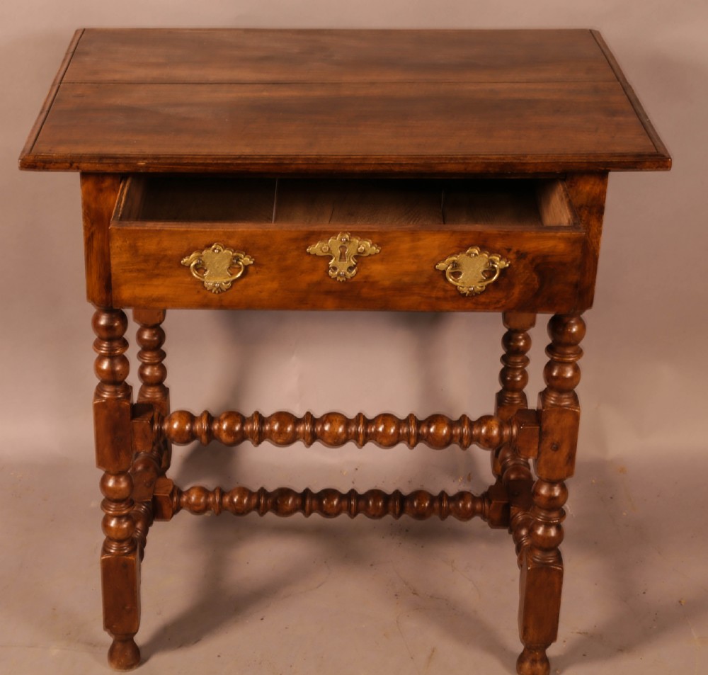 An early 18th century side table in Walnut View III