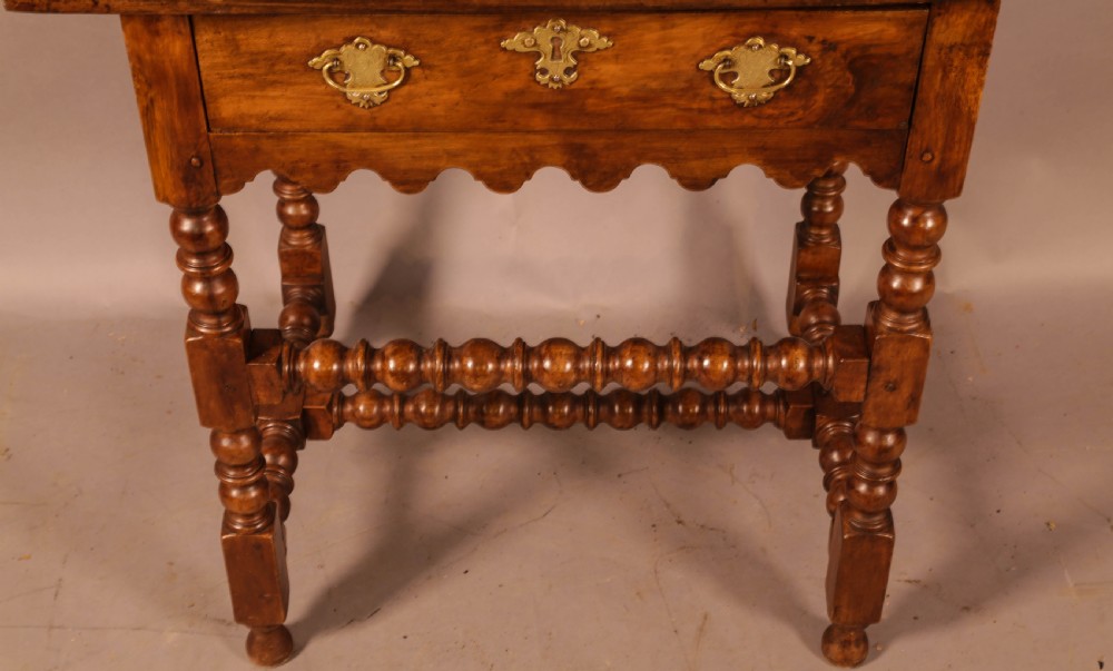 An early 18th century side table in Walnut View V