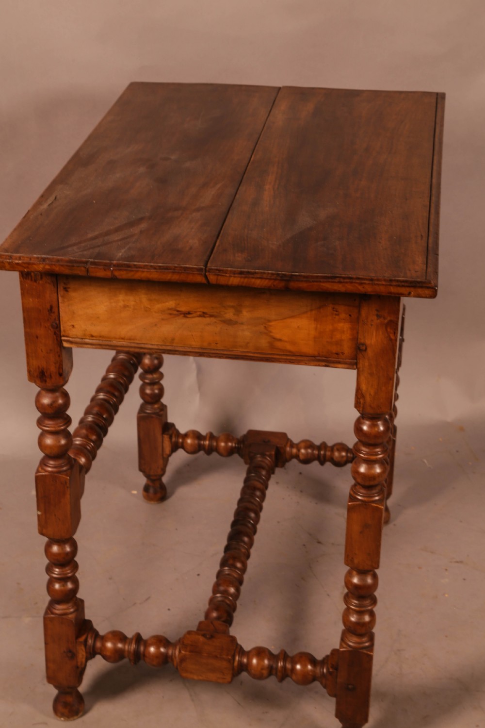 An early 18th century side table in Walnut View VI