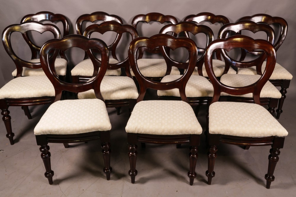 A Set of 12 Victorian Mahogany Balloon Back Dining chairs View III