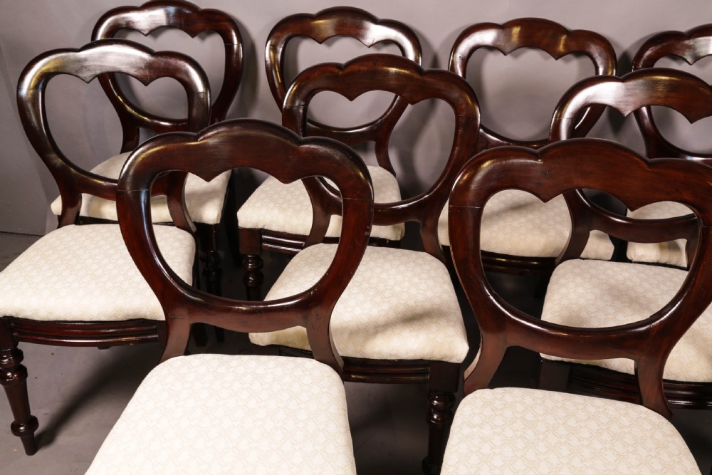 A Set of 12 Victorian Mahogany Balloon Back Dining chairs View IV