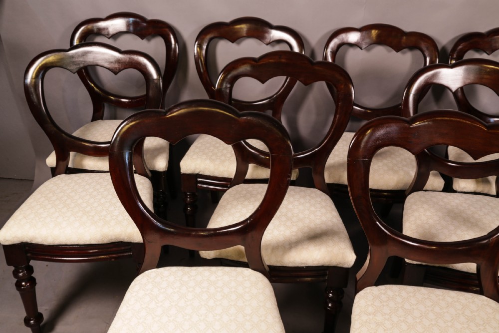 A Set of 12 Victorian Mahogany Balloon Back Dining chairs View V