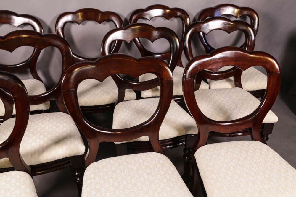 A Set of 12 Victorian Mahogany Balloon Back Dining chairs View VI