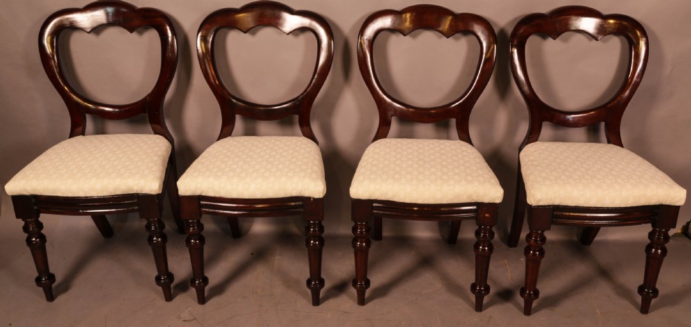 A Set of 12 Victorian Mahogany Balloon Back Dining chairs View VII