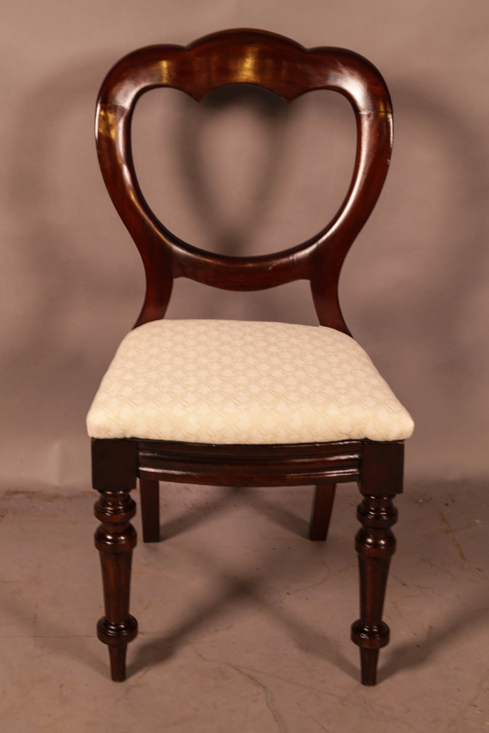 A Set of 12 Victorian Mahogany Balloon Back Dining chairs View IX