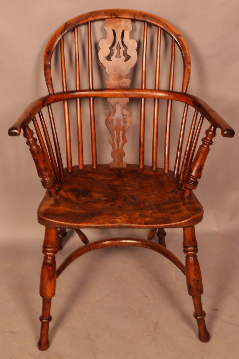 A Rare George Nicholson Best Model Yew Windsor chair