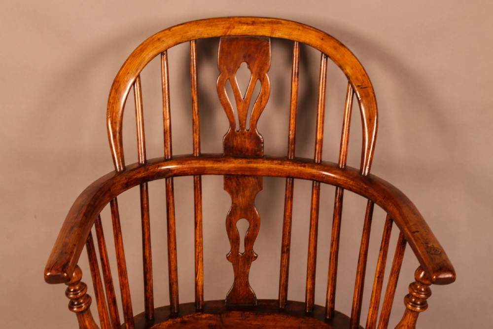A traditional ash and elm low-back Windsor armchair with a shaped saddle seat, turned legs, and a steam-bent back hoop. View VI