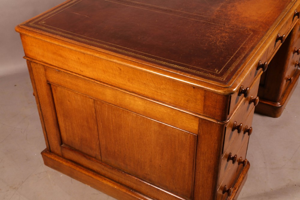 A Victorian Golden Oak Partners desk View VIII