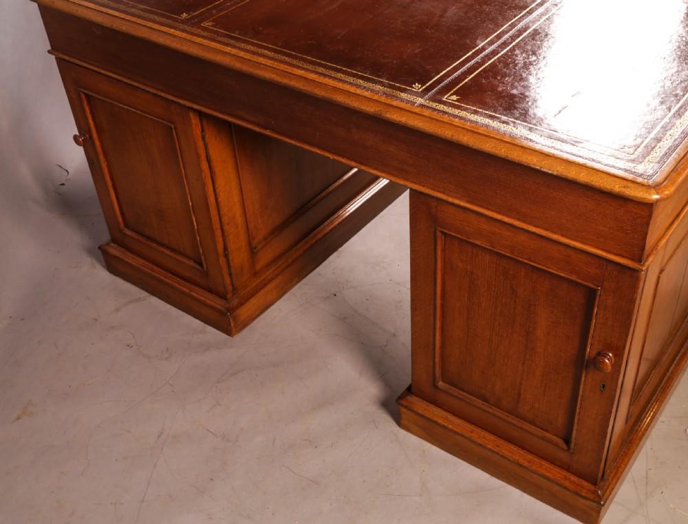 A Victorian Golden Oak Partners desk View IX