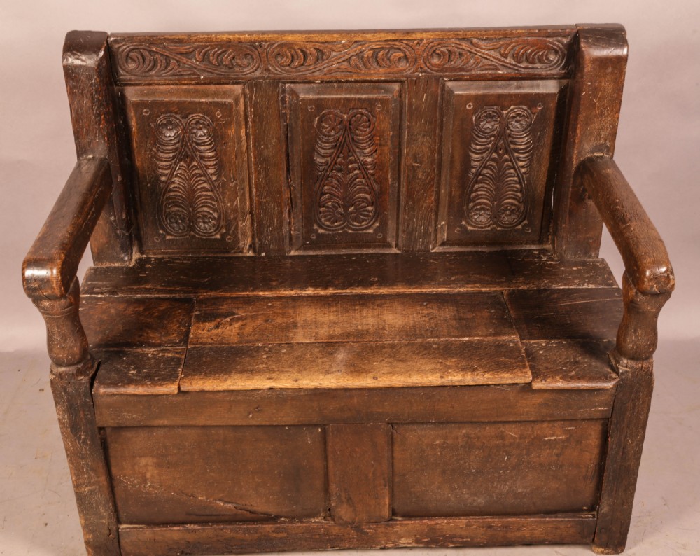 Early Oak Settle carved