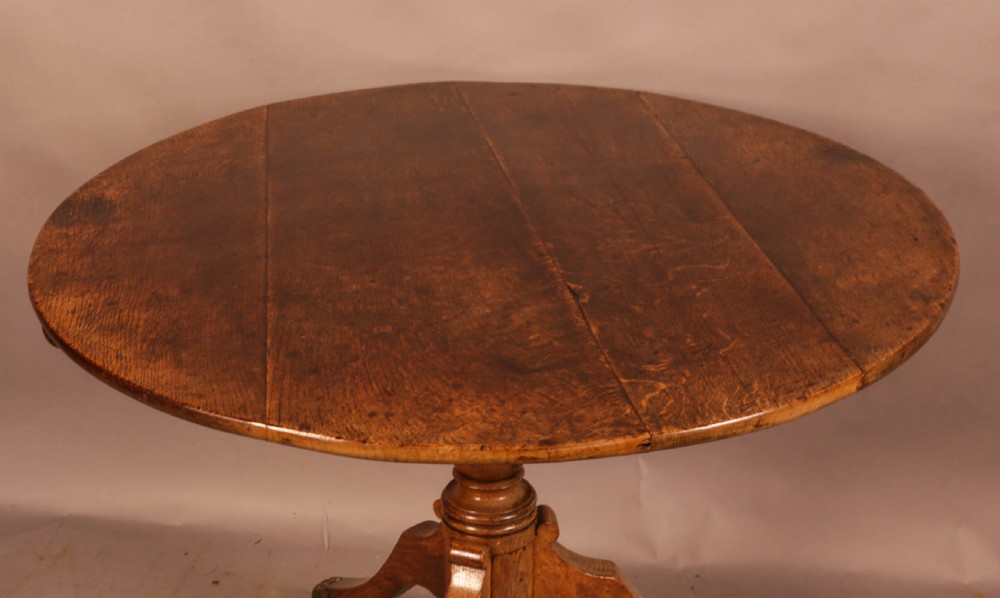 A Large Oak Tripod Supper Table View II