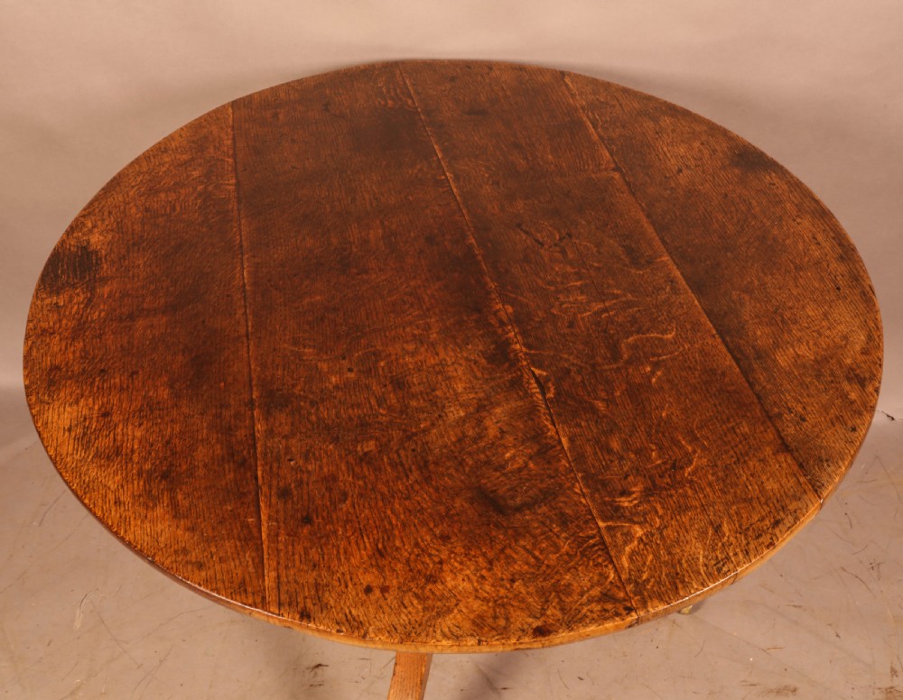 A Large Oak Tripod Supper Table View IV