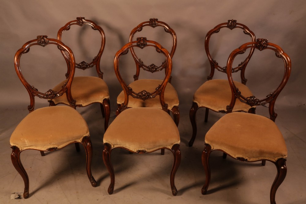 A Set of 6 Victorian Solid Walnut Dining Chairs