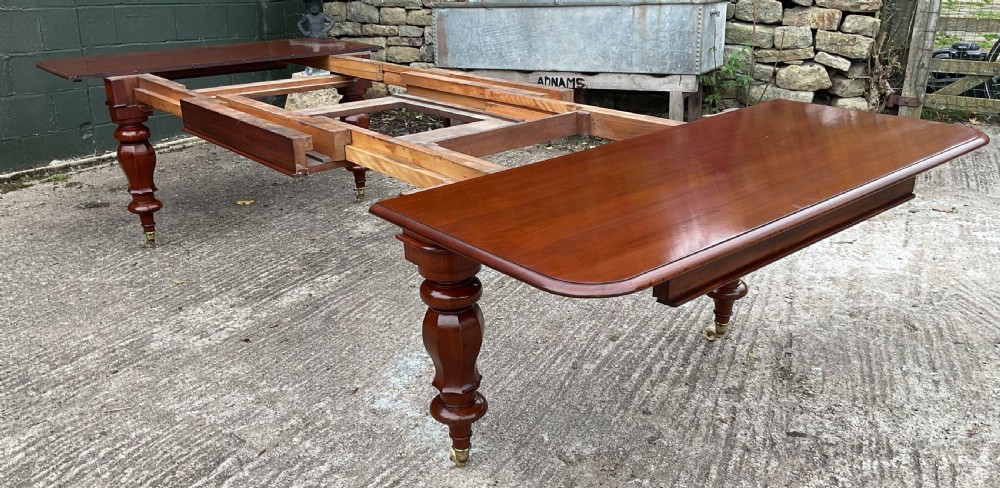 A Fine early Victorian Extending Dining Table Mahogany seat 12/14 View VII