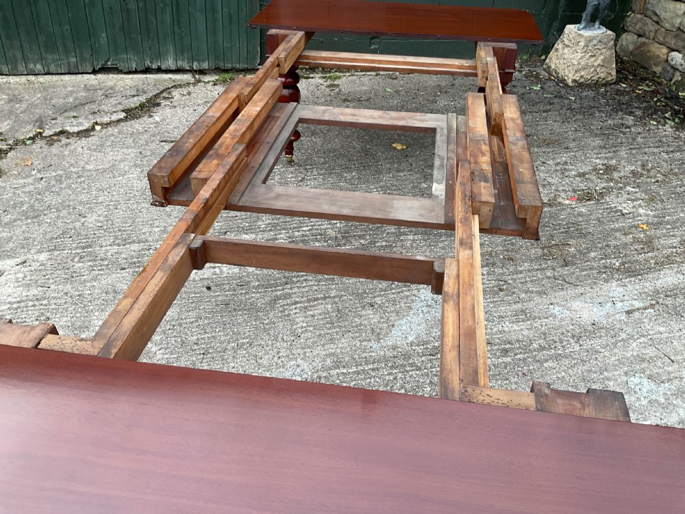 A Fine early Victorian Extending Dining Table Mahogany seat 12/14 View IX