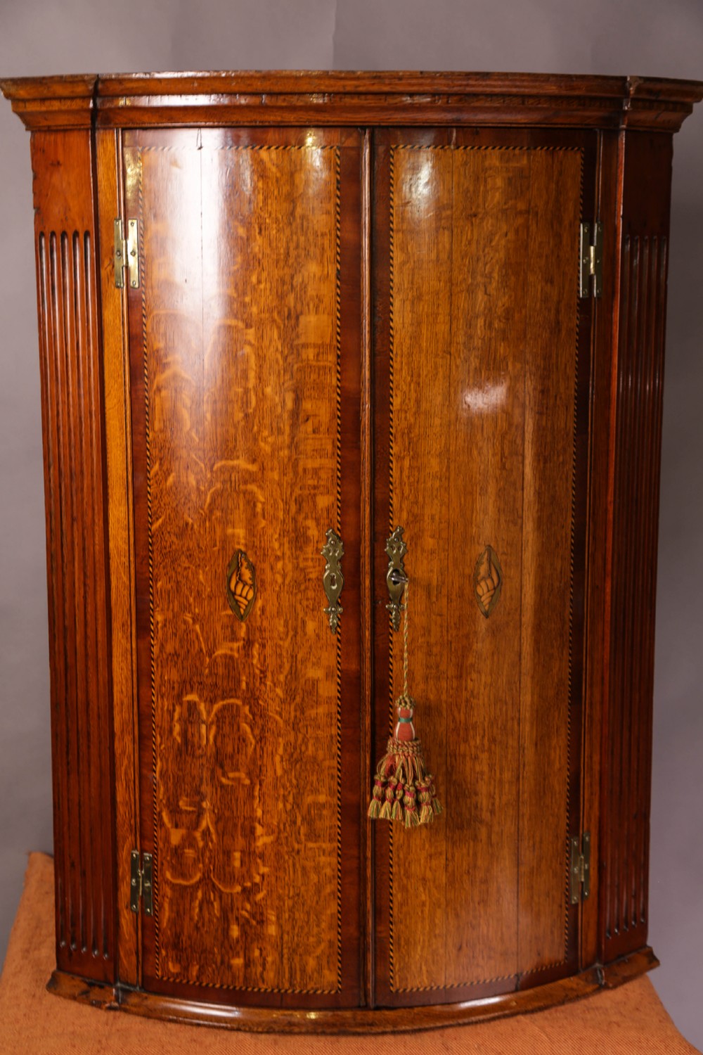A Super Bow Front Corner Cupboard in Oak