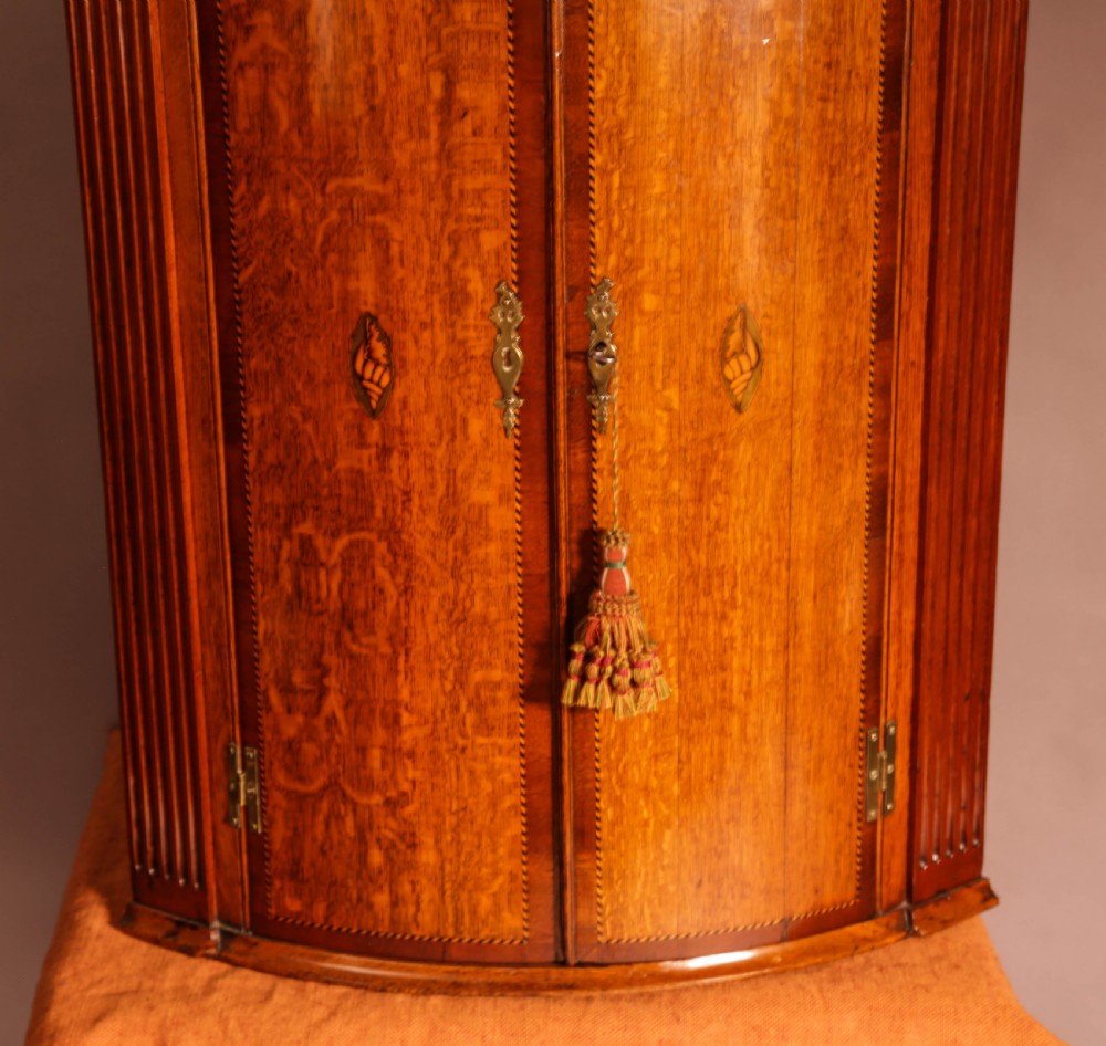 A Super Bow Front Corner Cupboard in Oak View III