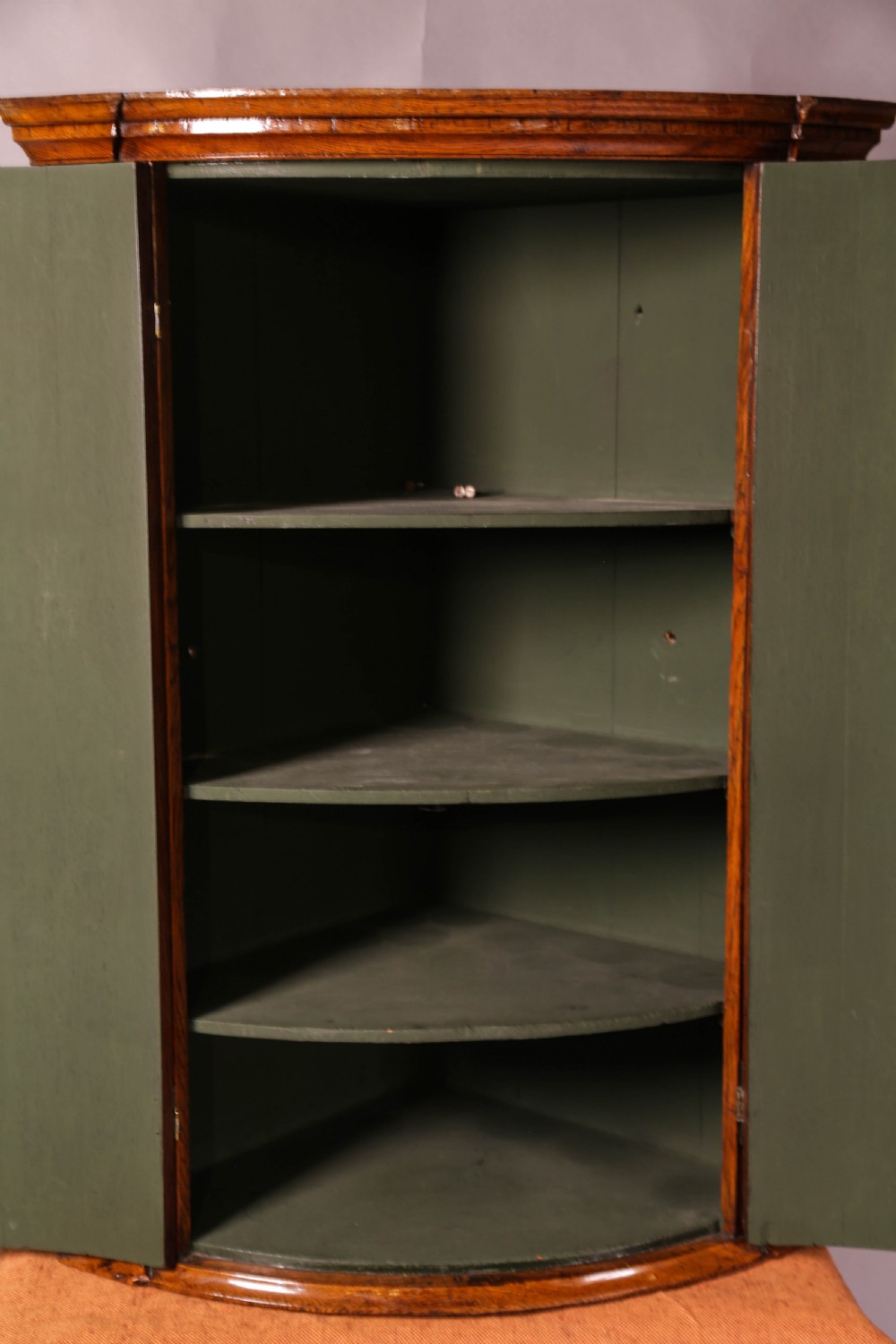 A Super Bow Front Corner Cupboard in Oak View VI