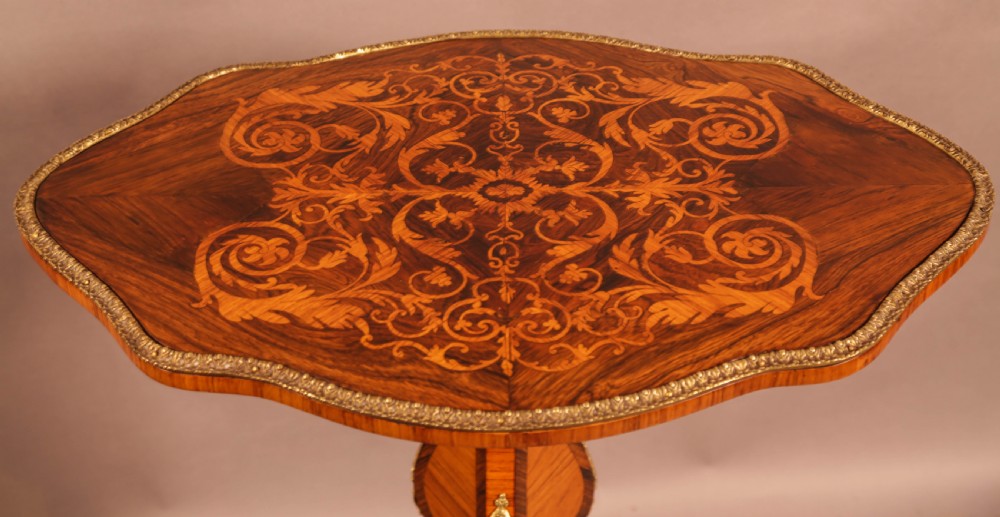 A French ocasional table in King Wood and Rosewood Inlaid View IV