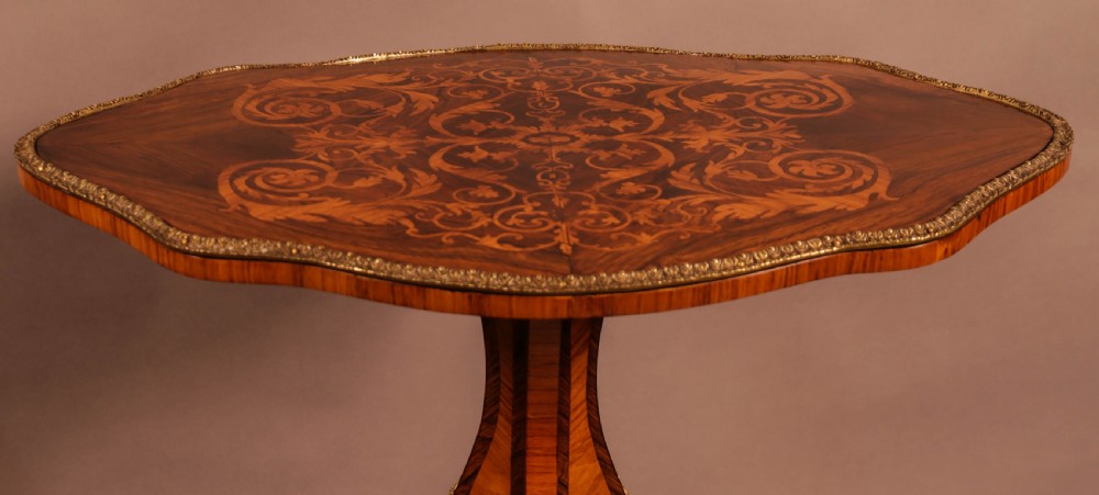 A French ocasional table in King Wood and Rosewood Inlaid View V