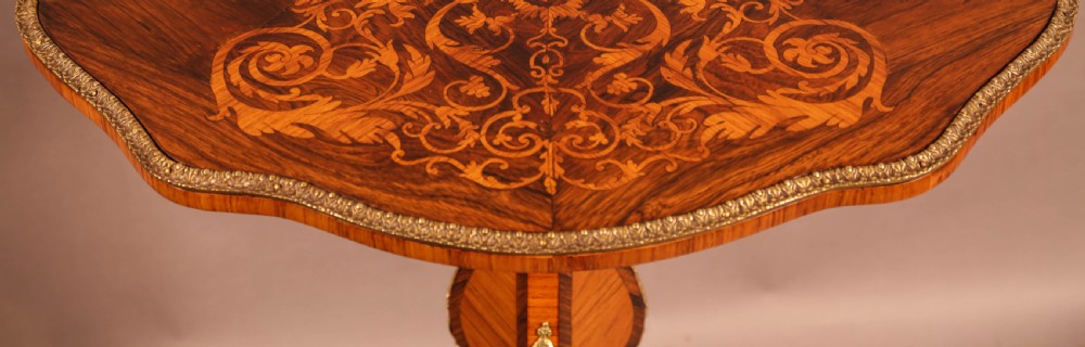 A French ocasional table in King Wood and Rosewood Inlaid View VI