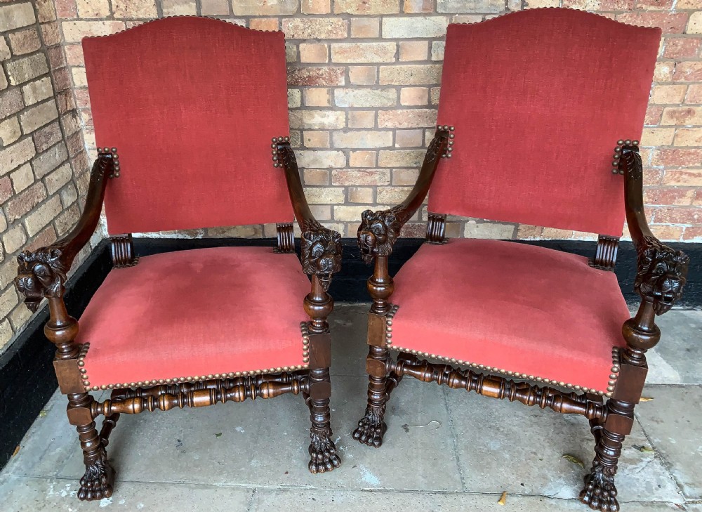 An Impressive pair of Victorian Armchairs carved lions
