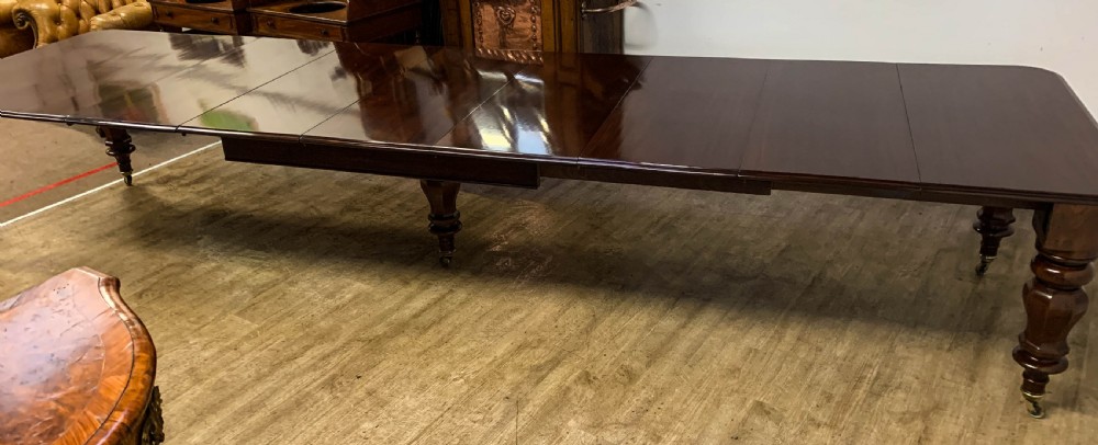 A Very Large Victorian Extending Dining Table in Mahogany seat 12/14 View III