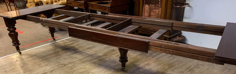 A Very Large Victorian Extending Dining Table in Mahogany seat 12/14 View XIV