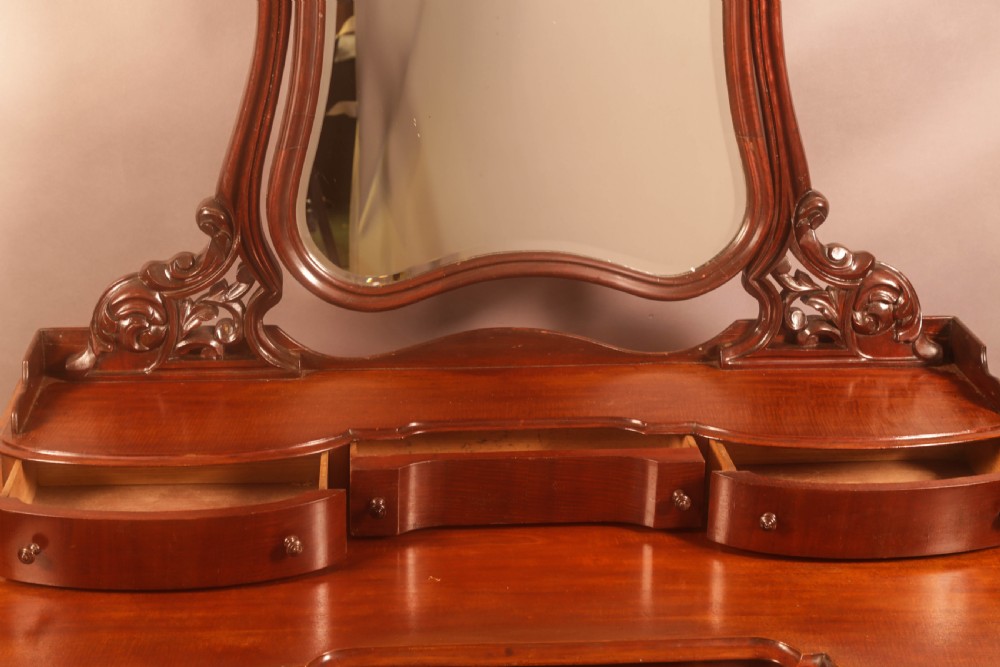 A Victorian Duchess Dressing table in mahogany View IV