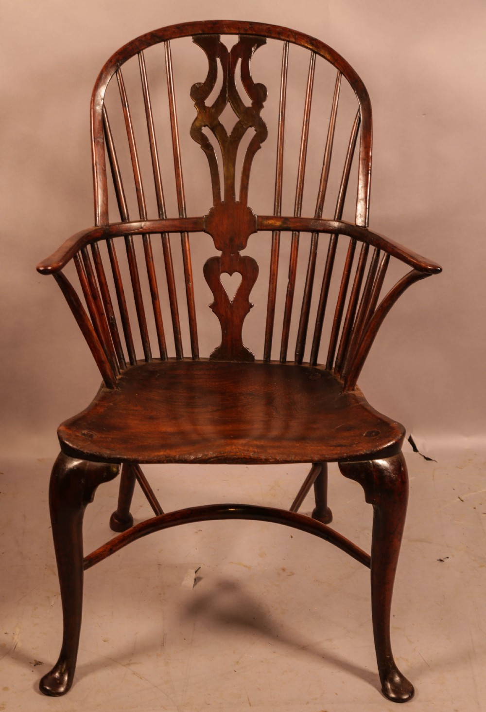 An 18th century Cab Leg Yew Windsor Chair