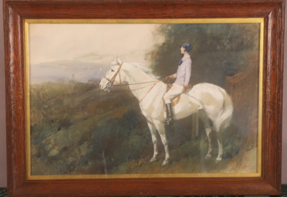 A pair of framed watercolour paintings depicting equestrian subjects within dark wooden frames with gilt inner liners. View II