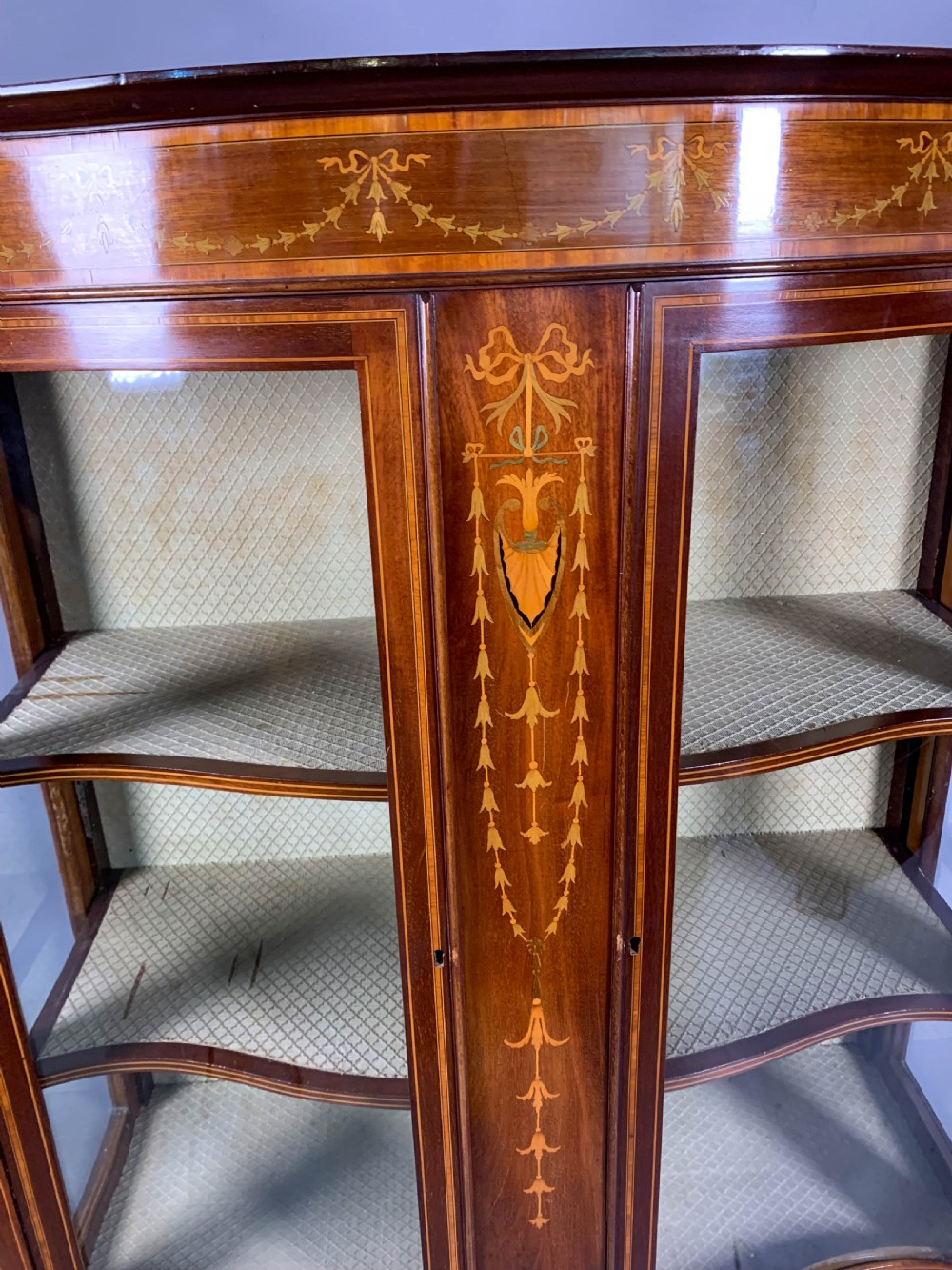 A Late Victorian Mahogany with inlay serpentine shape display cabinet View IV