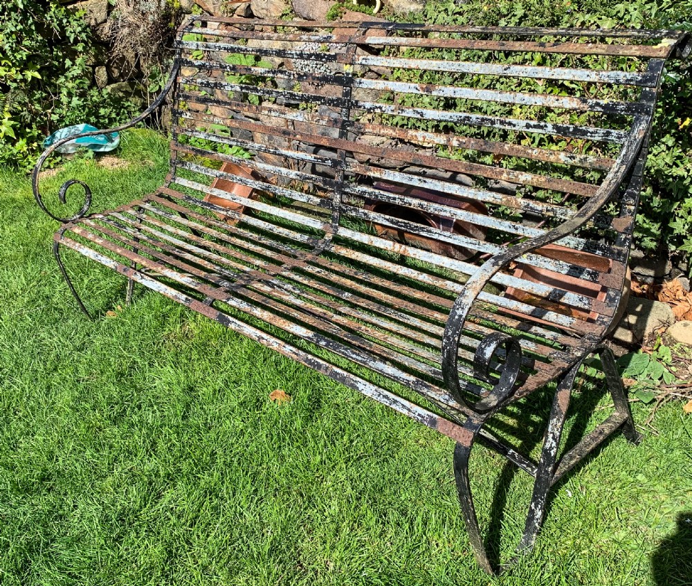 A Wrought Iron Garden Bench old paint View II