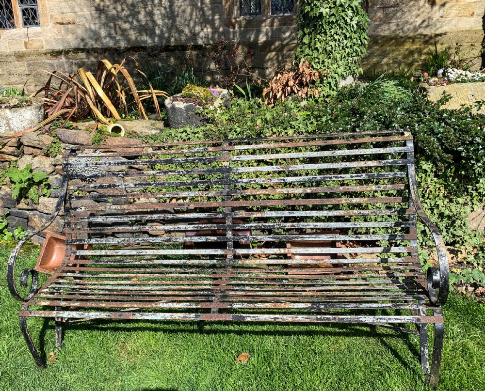 A Wrought Iron Garden Bench old paint View III