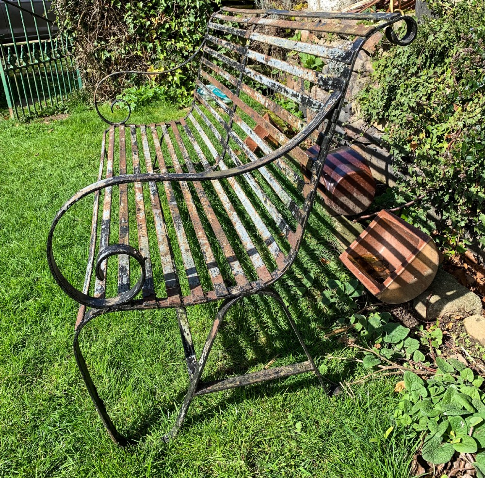 A Wrought Iron Garden Bench old paint View IV