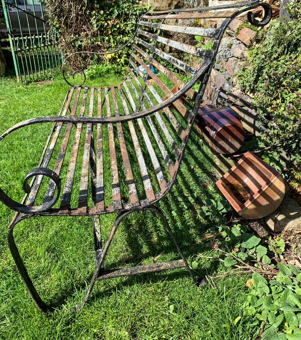 A Wrought Iron Garden Bench old paint View V