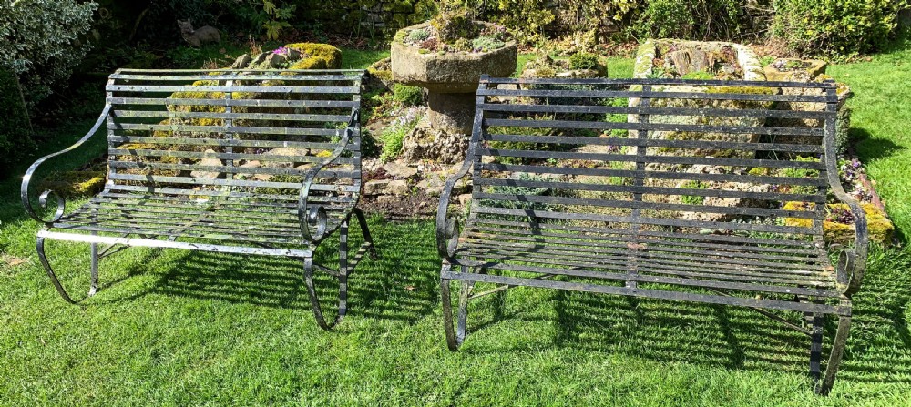 A Rare Matching Pair of Wrought Iron Garden Benches